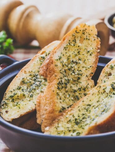 A bowl of air fryer garlic bread