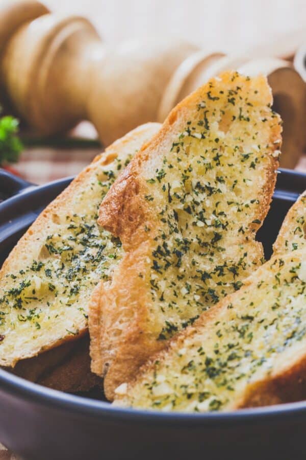 A bowl of air fryer garlic bread