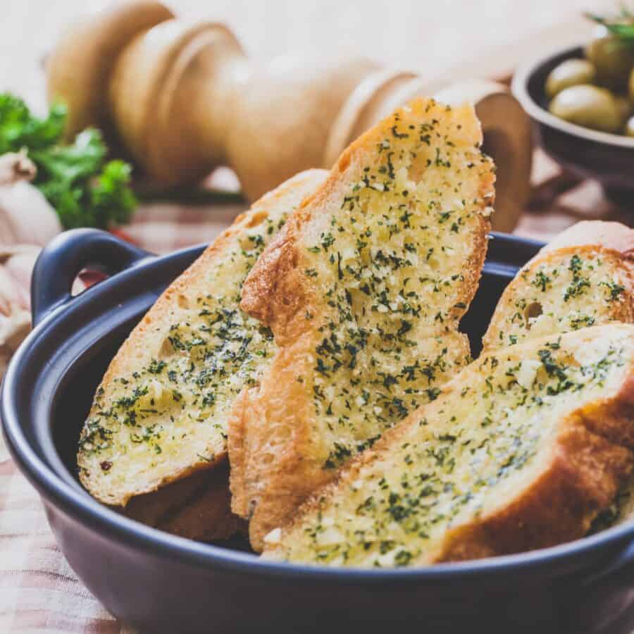 A bowl of air fryer garlic bread
