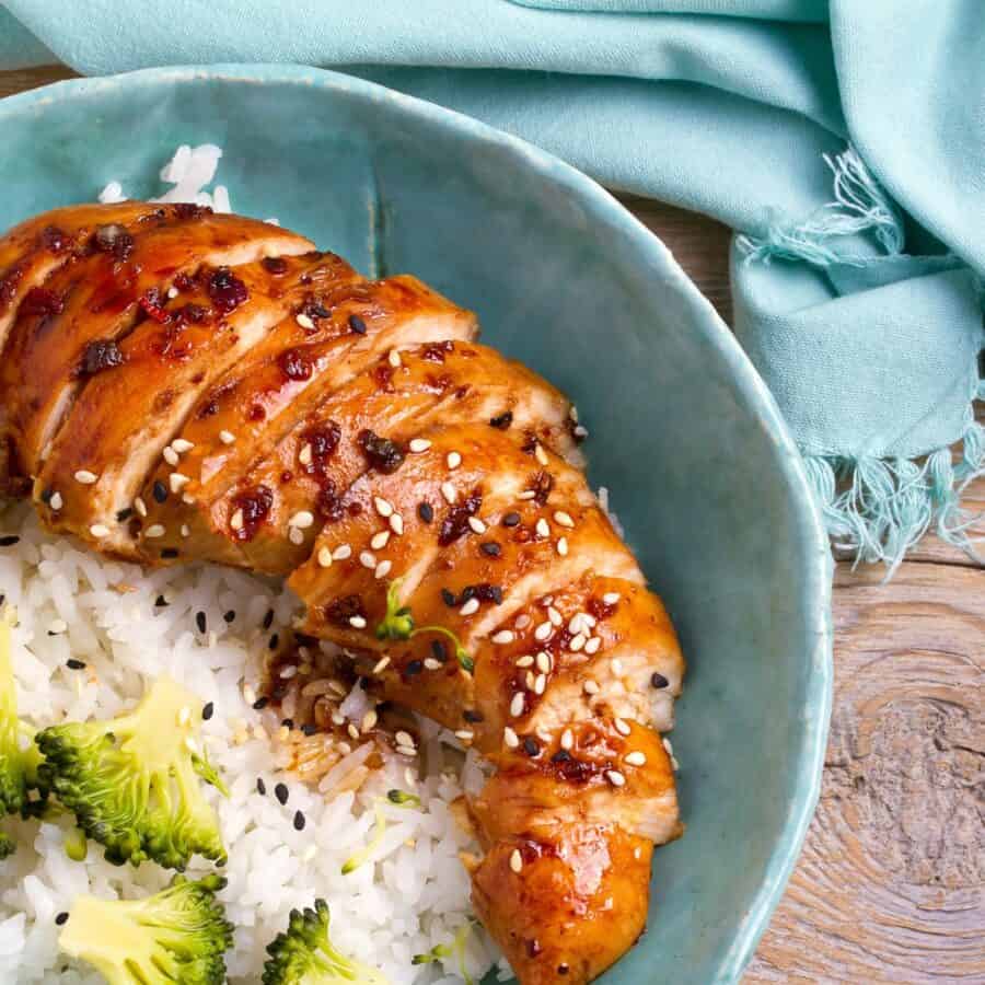 Close up image of Baked Chicken Teriyaki in a blue bowl