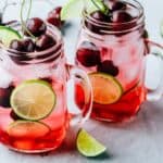 two glass mugs of cherry limeade - 7
