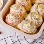 Close up image of Pumpkin Cinnamon Rolls with cream cheese frosting - 8