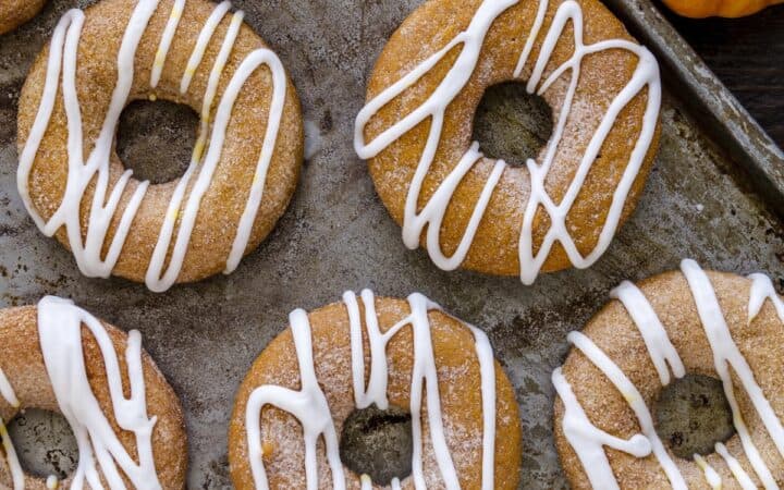 Overhead image of Pumpkin Donuts on a baking pan