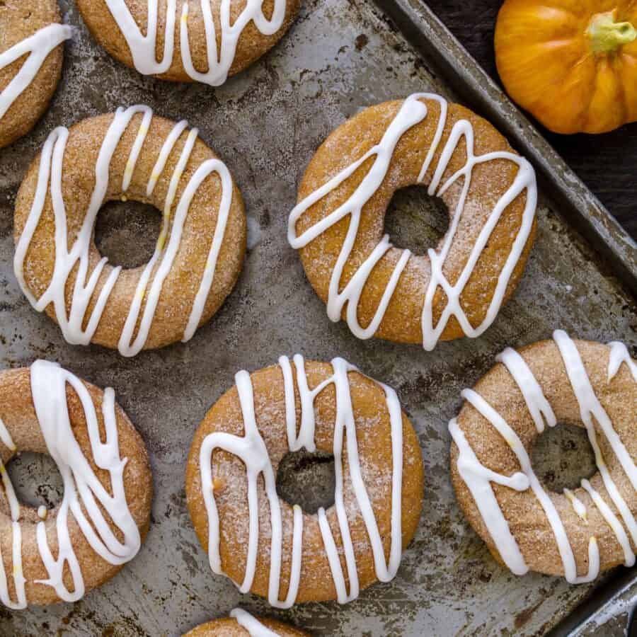 Overhead image of Pumpkin Donuts on a baking pan