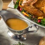 Overhead image of Turkey Gravy in a metal gravy boat - 8