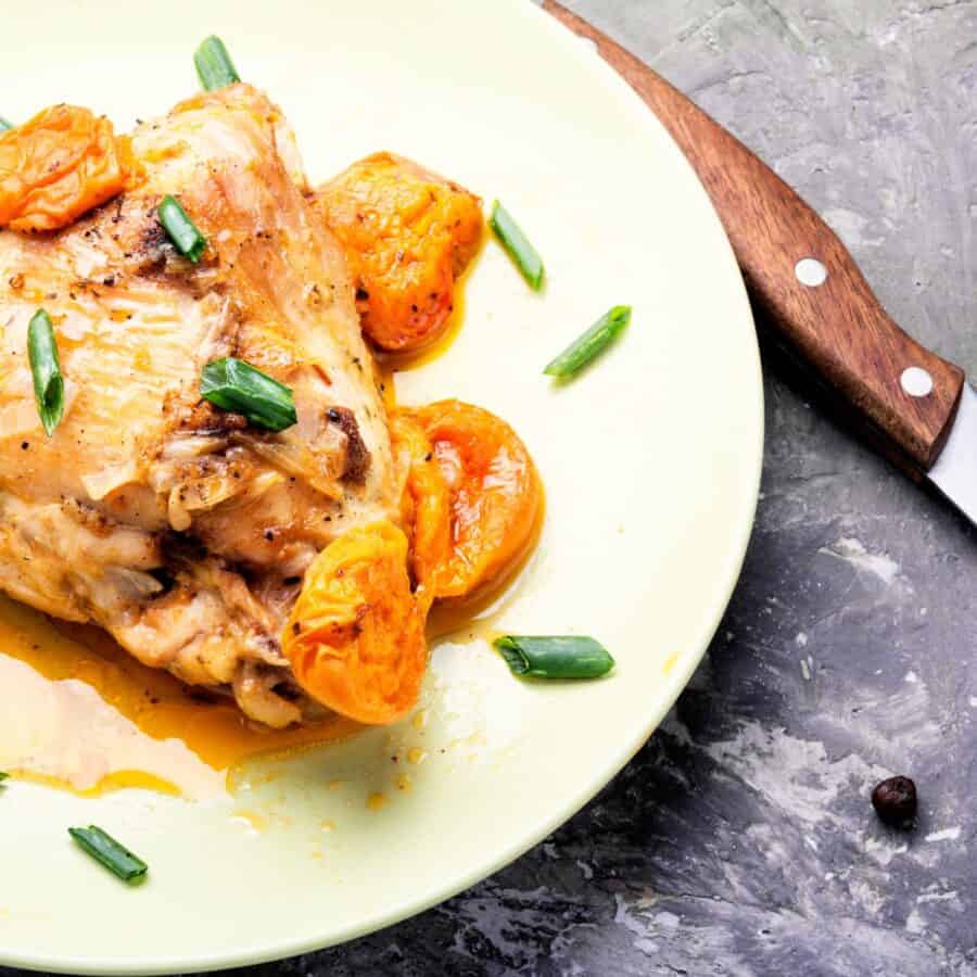 Close up image of Apricot Chicken on a white plate