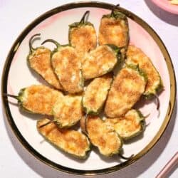 Overhead image of Baked Jalapeno Poppers on a white plate