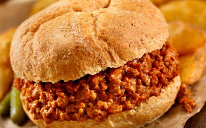 Close up image of Crock Pot Sloppy Joes on parchment paper