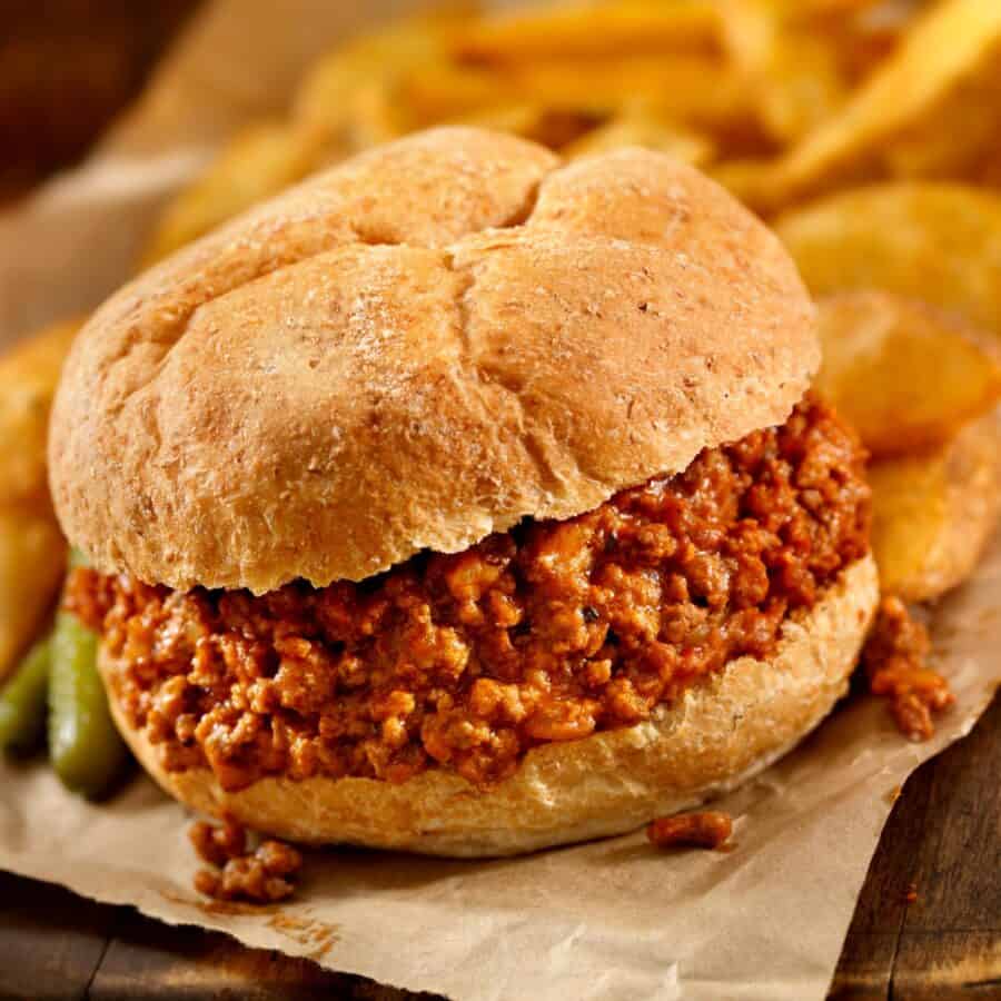 Close up image of Crock Pot Sloppy Joes on parchment paper