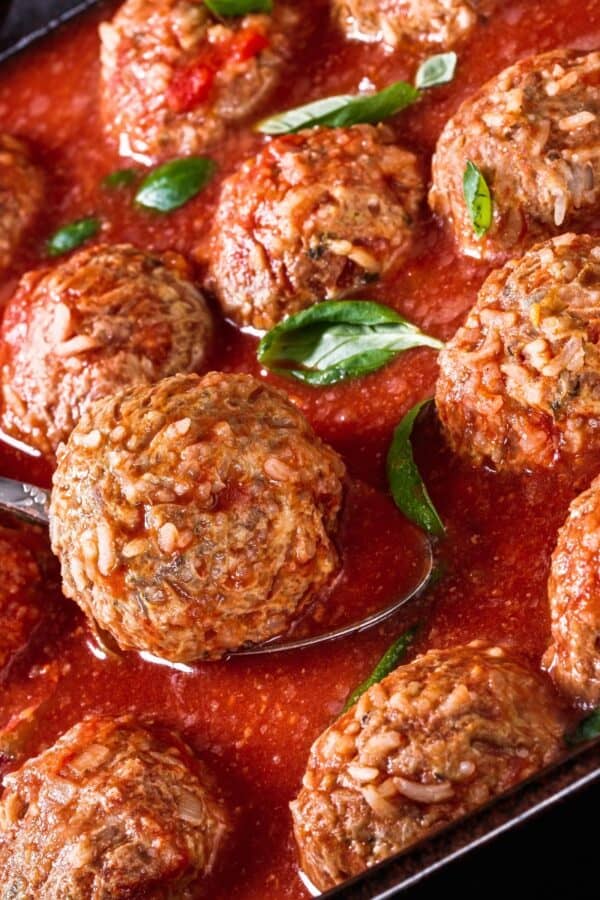 Close up image of Porcupine Meatballs in sauce