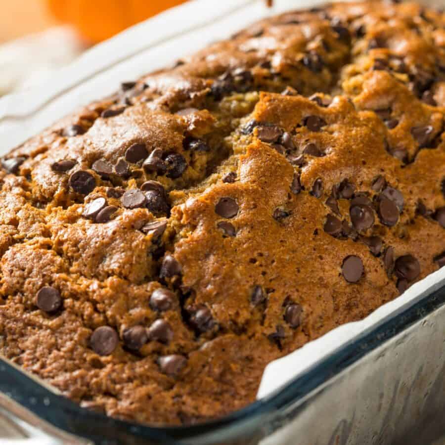 A close up image of a loaf of Pumpkin Chocolate Chip Bread