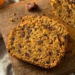 Sliced Pumpkin Chocolate Chip Bread on a wooden cutting board - 8