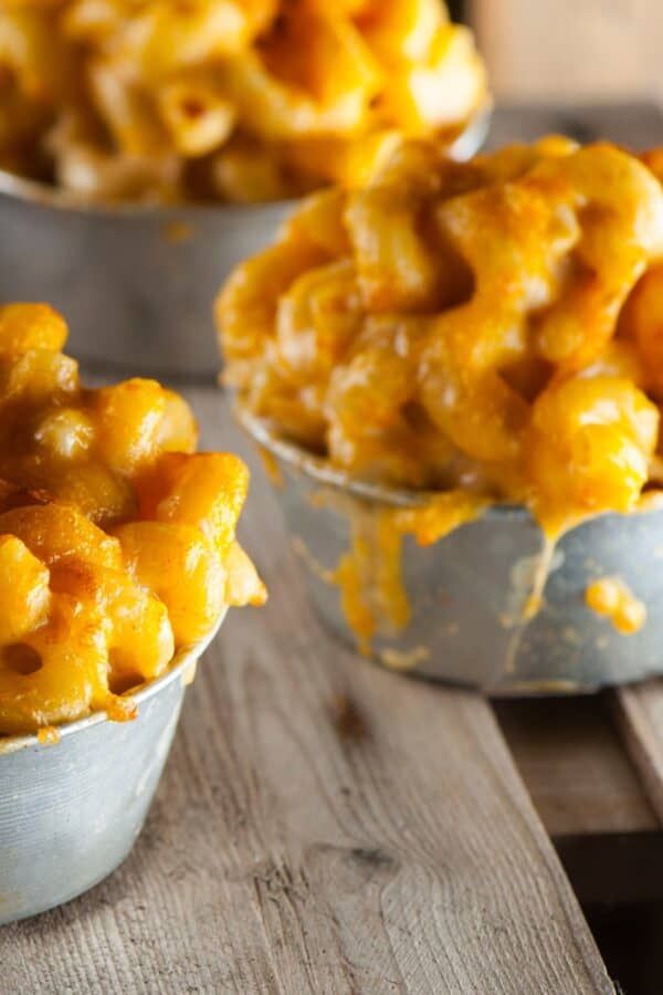 Close up image of bowls of pumpkin mac and cheese