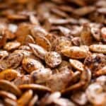 Close up image of roasted pumpkin seeds - 13