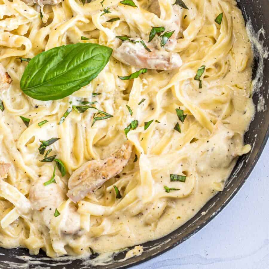 Close up image of Crock Pot Chicken Alfredo in a pan