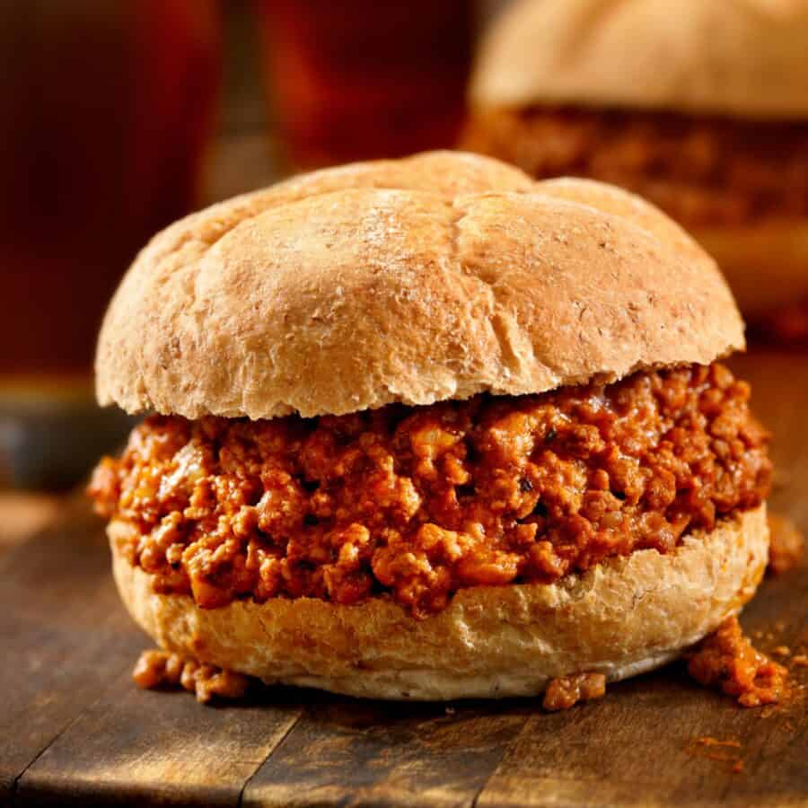 Close up image of Crock Pot Sloppy Joes on a wooden table