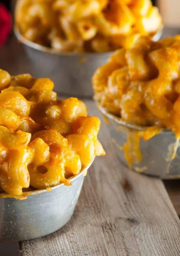 Close up image of bowls of pumpkin mac and cheese