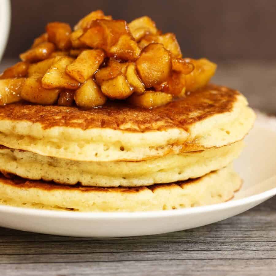 Close up image of Apple Pie Pancakes on a white plate