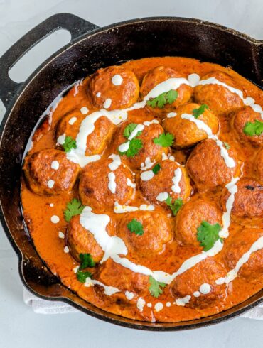 Overhead image of Butter Chicken Meatballs in a skillet