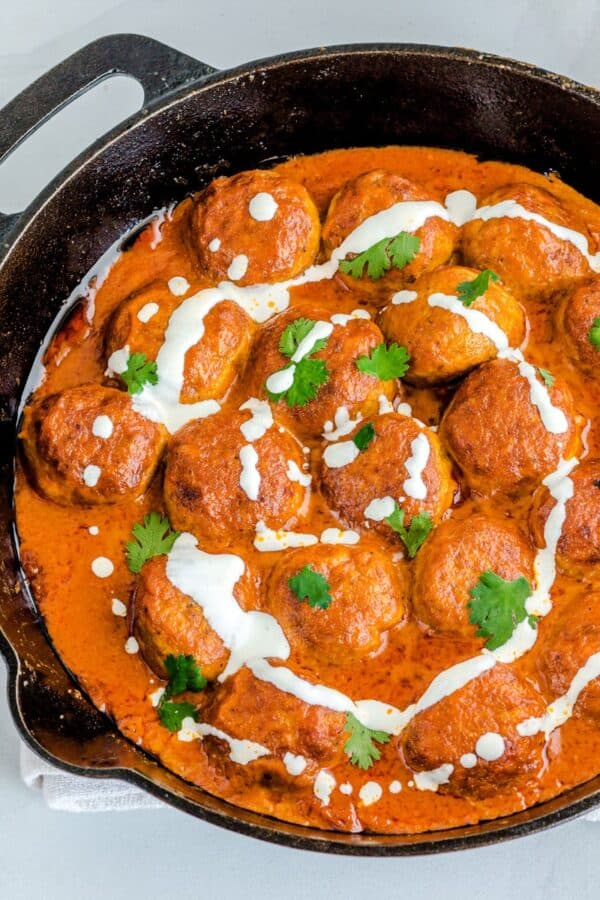 Overhead image of Butter Chicken Meatballs in a skillet