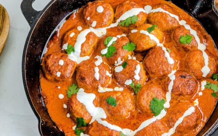 Overhead image of Butter Chicken Meatballs in a skillet