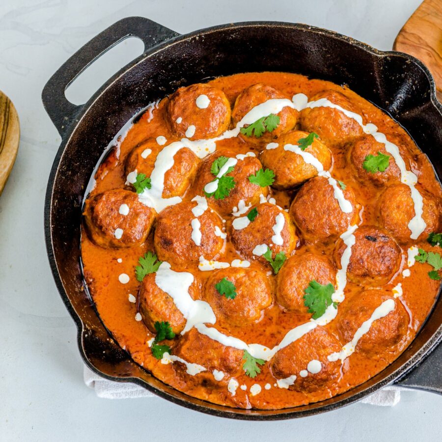 Overhead image of Butter Chicken Meatballs in a skillet