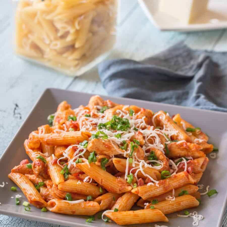 Chicken Penne Pasta on a square plate