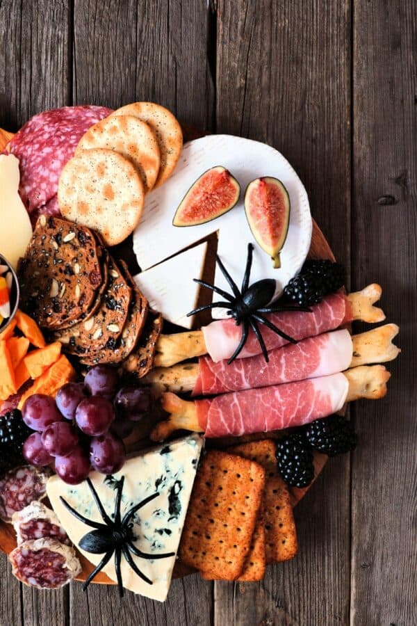 Overhead image of a Halloween Charcuterie Board on a wooden background