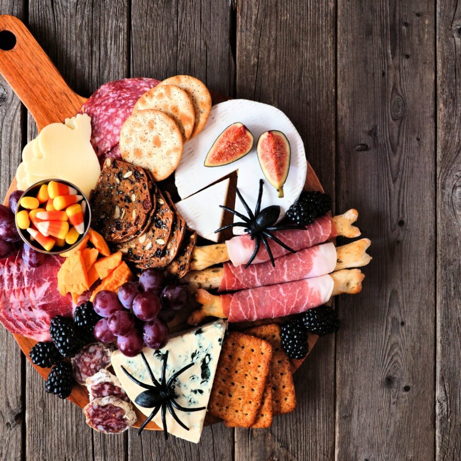 Overhead image of a Halloween Charcuterie Board on a wooden background