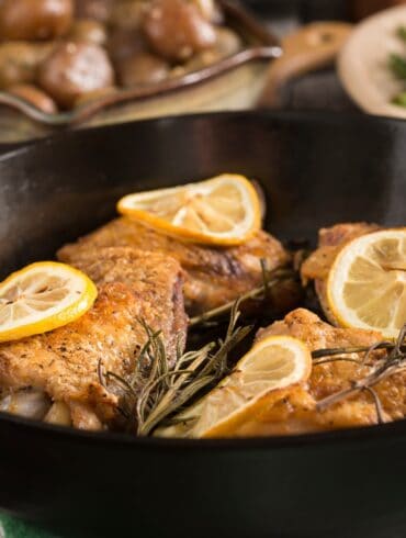 Close up image of Lemon Chicken Thighs in a skillet