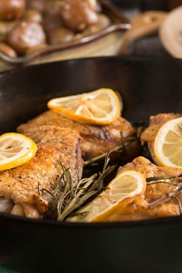 Close up image of Lemon Chicken Thighs in a skillet