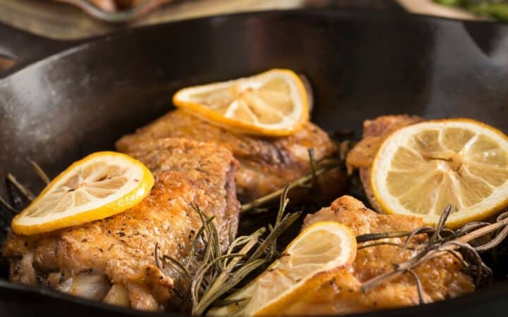 Close up image of Lemon Chicken Thighs in a skillet