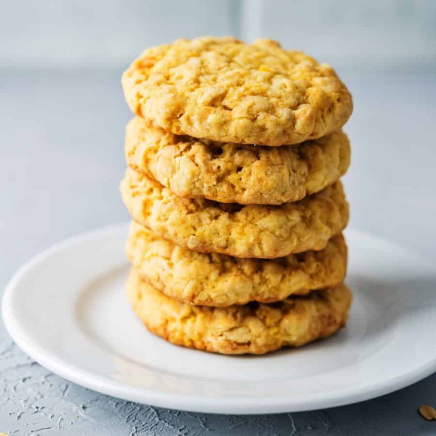 A stack of five Pumpkin Oatmeal Cookies on a white plate