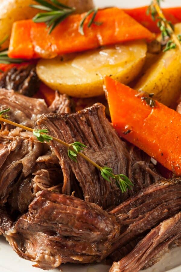 Slow Cooker Chuck Roast with potatoes and carrots on a serving platter