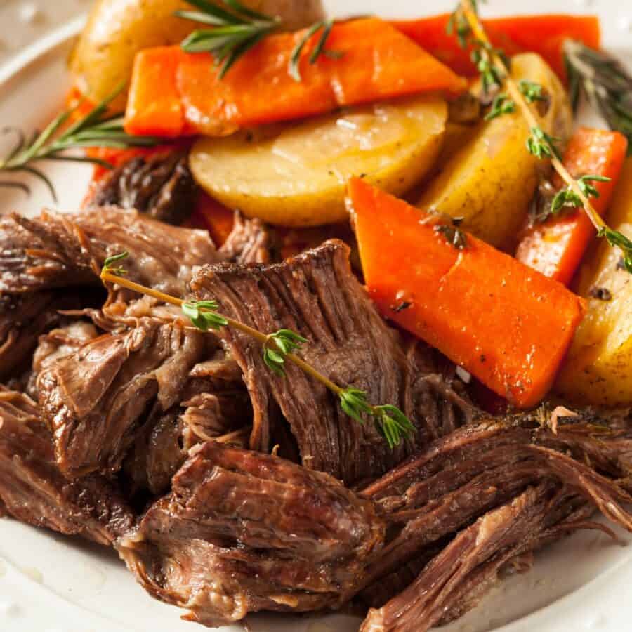 Slow Cooker Chuck Roast with potatoes and carrots on a serving platter