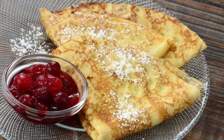 Overhead image of Swedish Pancakes on a plate with jam