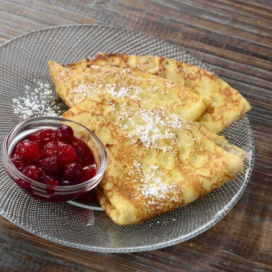 Overhead image of Swedish Pancakes on a plate with jam