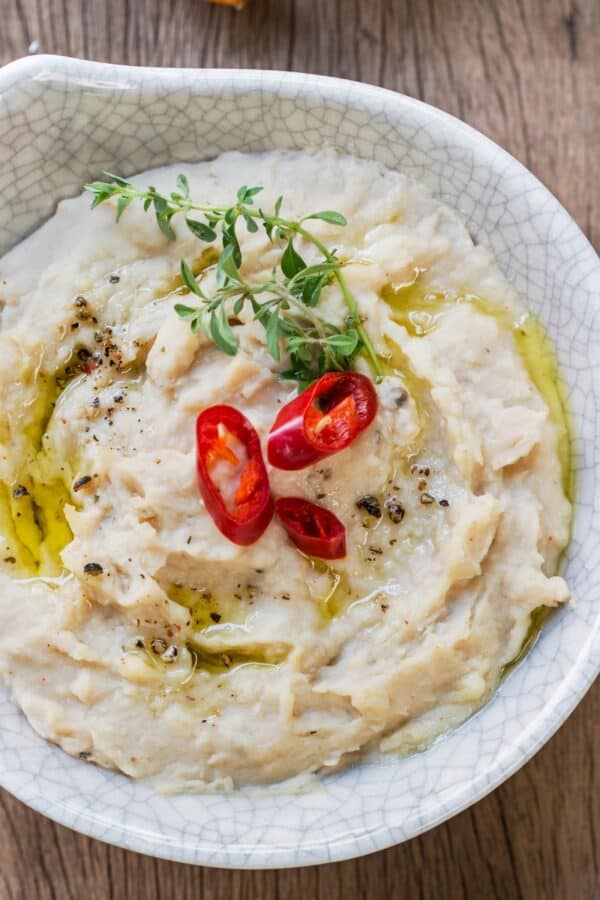 Overhead image of white bean dip in a bowl