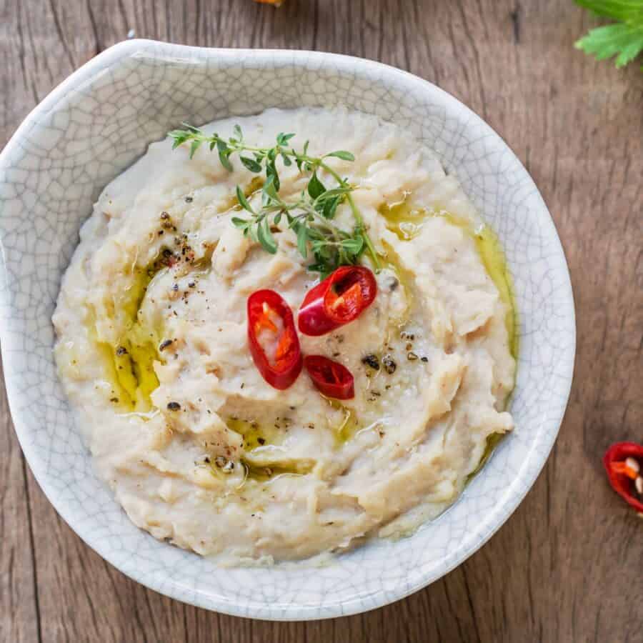 Overhead image of white bean dip in a bowl