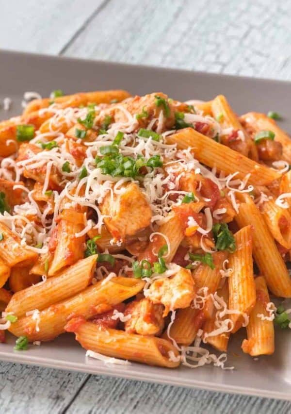 Close up image of Chicken Penne Pasta on a square plate