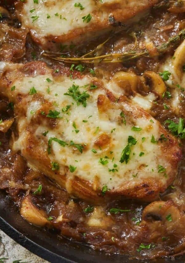 Close up image of French Onion Pork Chops in a skillet