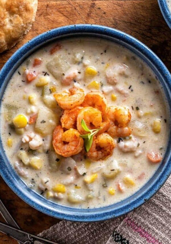 Overhead image of Shrimp and Corn Soup in a blue bowl