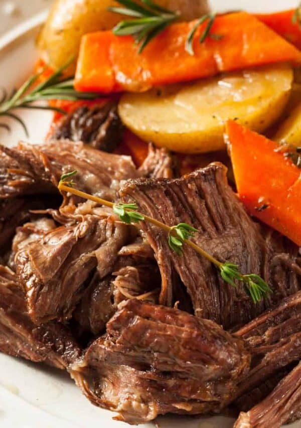 Slow Cooker Chuck Roast with potatoes and carrots on a serving platter