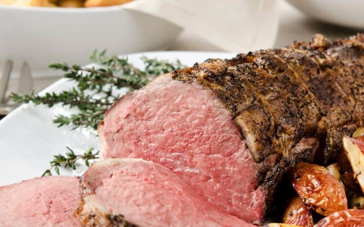 Sliced Beef Tenderloin Roast on a white plate