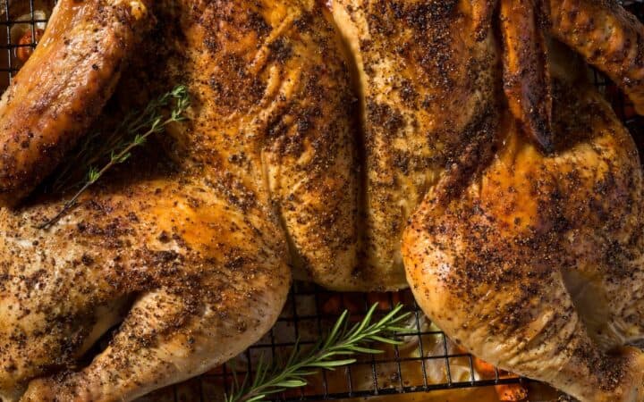 Overhead image of a Spatchcock Turkey on a roasting pan