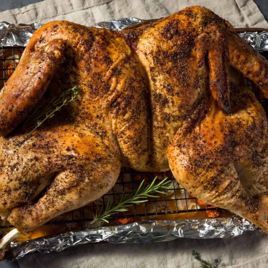 Overhead image of a Spatchcock Turkey on a roasting pan