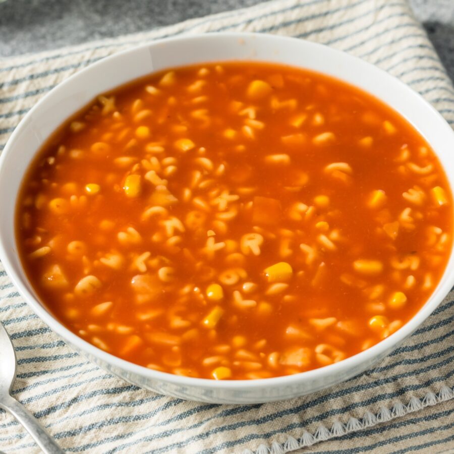 Close up image of Alphabet Soup in a white bowl