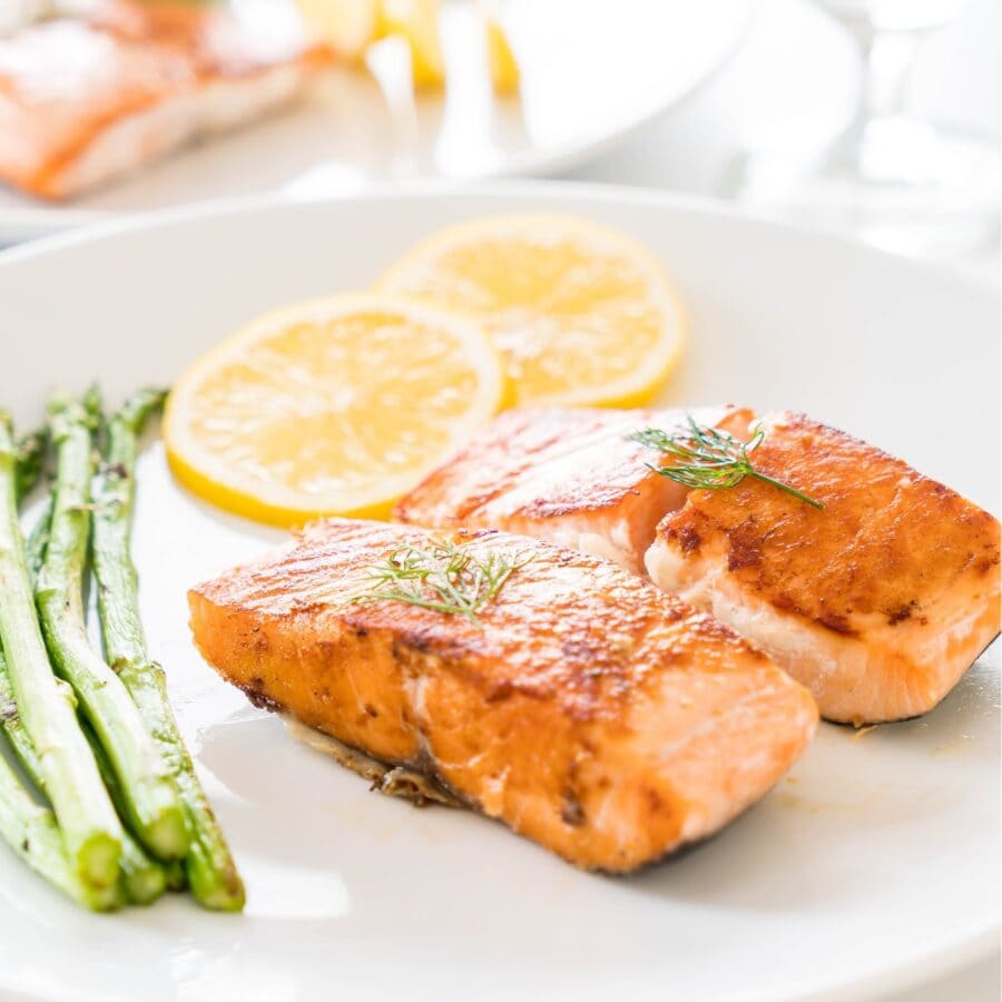 Honey Lemon Salmon on a plate with asparagus