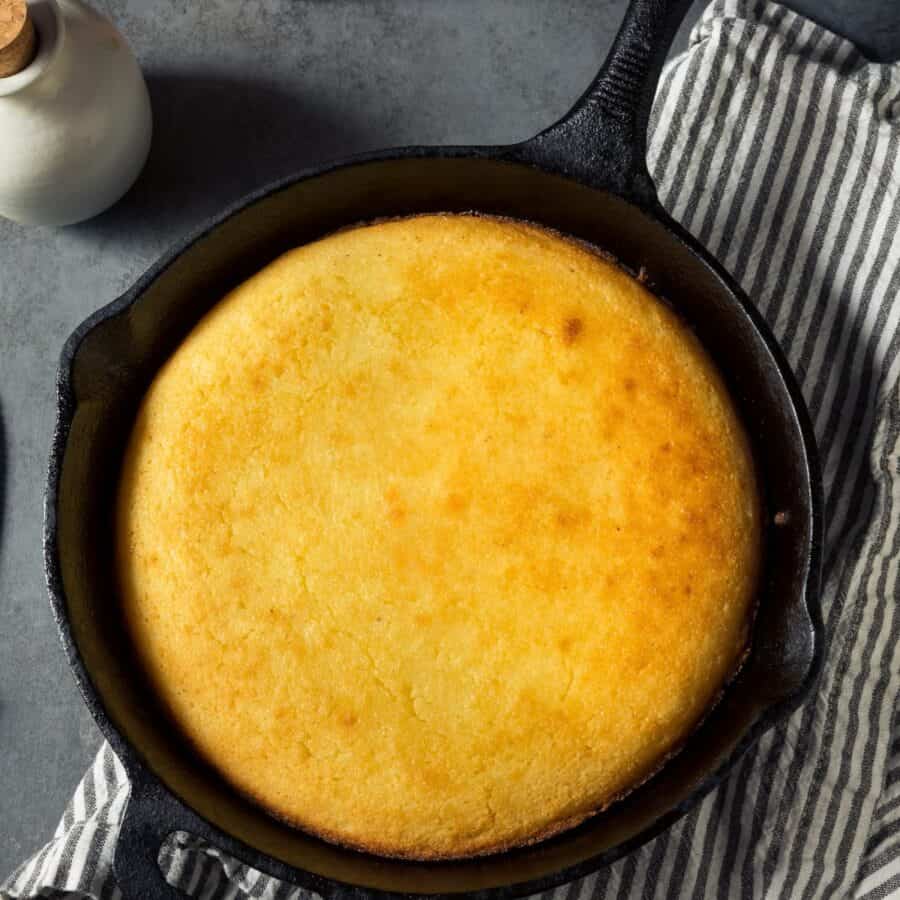 Overhead image of Skillet Cornbread on a decorative towel