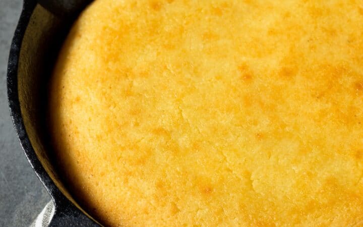 Close up image of Skillet Cornbread in a cast iron pan